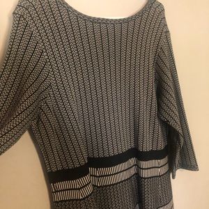 Woman’s Black and White Dress